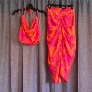 2 piece skirt and halter from etiquette boutique size med top and large bottom